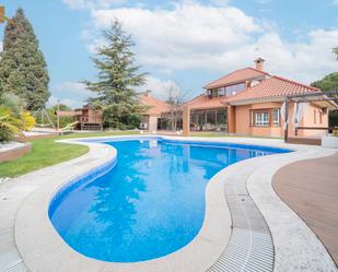 Swimming pool of House or chalet to rent in Villaviciosa de Odón  with Air Conditioner, Heating and Private garden