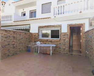 Jardí de Casa adosada en venda en El Portil amb Calefacció, Jardí privat i Parquet