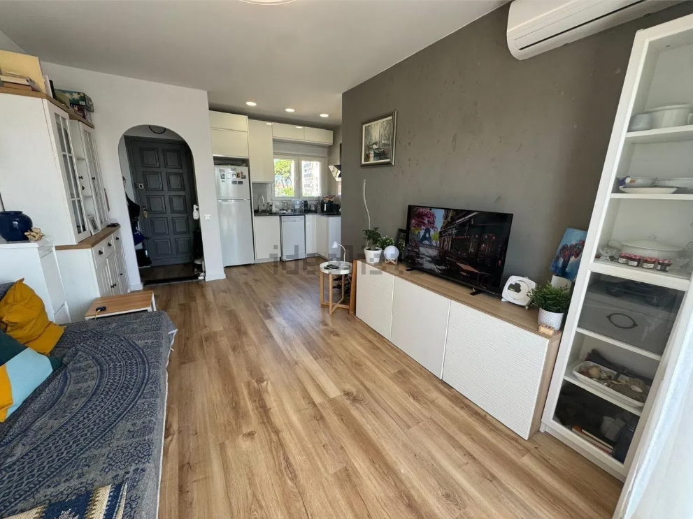 Sala de estar de Apartamento en venta en L'Escala con Aire acondicionado, Terraza y Trastero