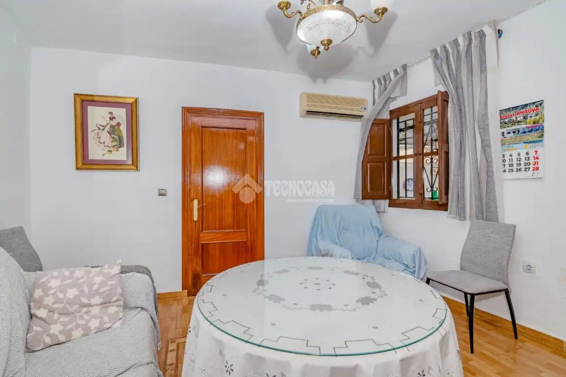 Sala d'estar de Casa adosada en venda en Loja amb Aire condicionat, Terrassa i Traster