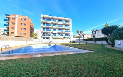 Swimming pool of Planta baja for sale in Calafell  with Air Conditioner, Heating and Private garden