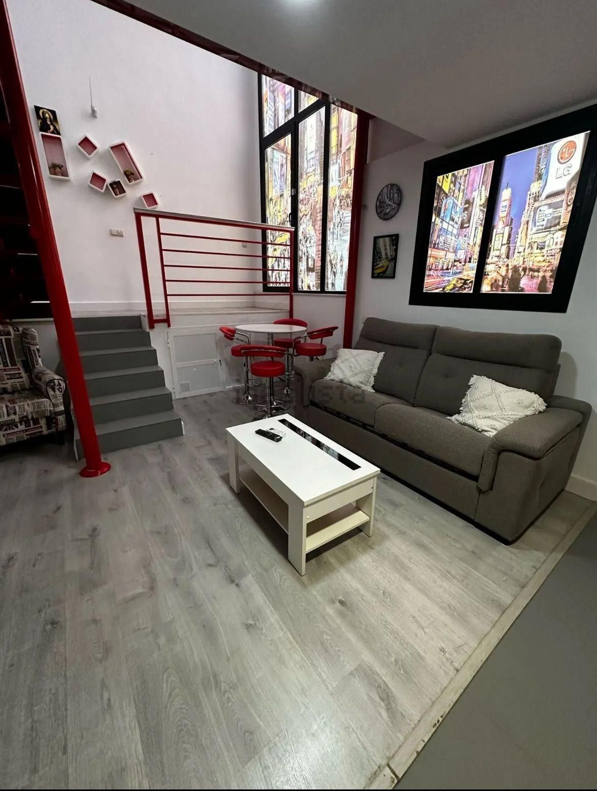Sala d'estar de Dúplex de lloguer en  Almería Capital amb Aire condicionat i Terrassa