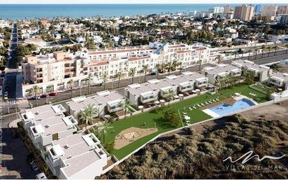 Exterior view of Single-family semi-detached for sale in Roquetas de Mar  with Private garden, Terrace and Community pool