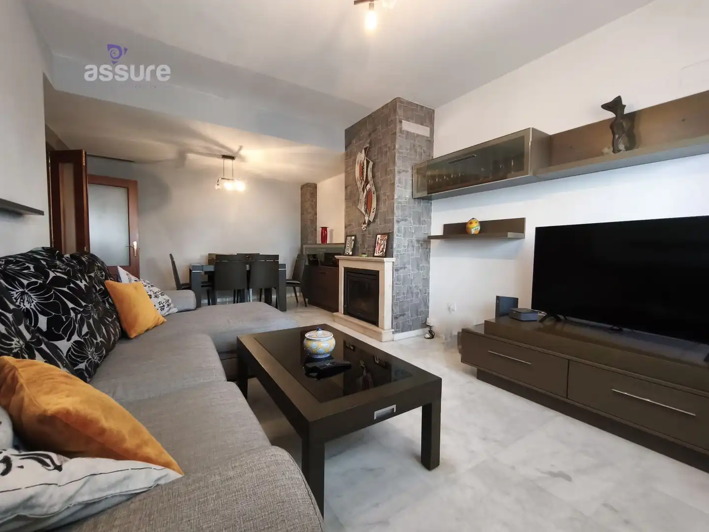 Sala de estar de Casa adosada en venta en Huelva con Aire acondicionado, Calefacción y Jardín privado
