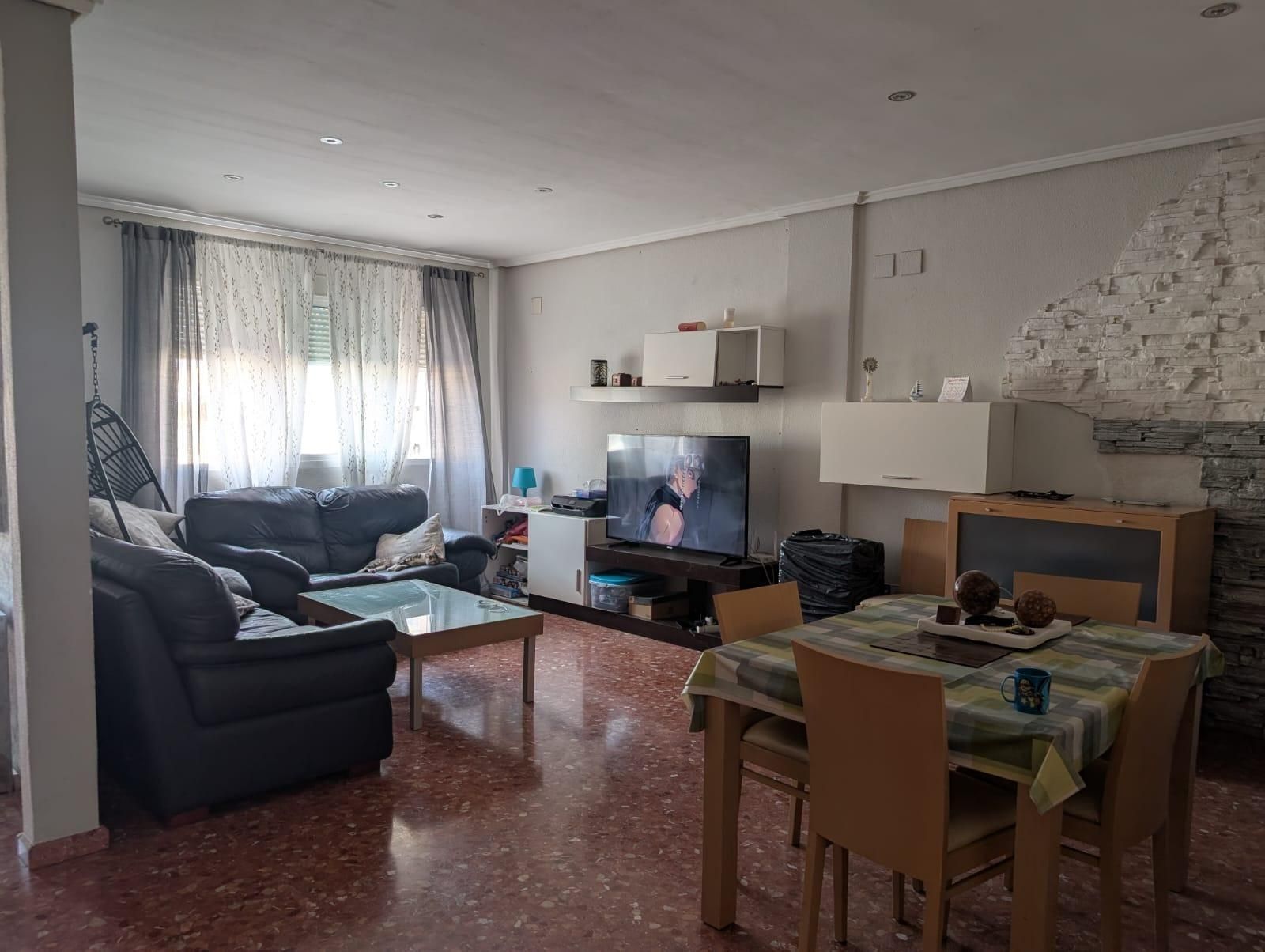 Sala de estar de Casa adosada en venta en La Llosa de Ranes con Aire acondicionado y Terraza