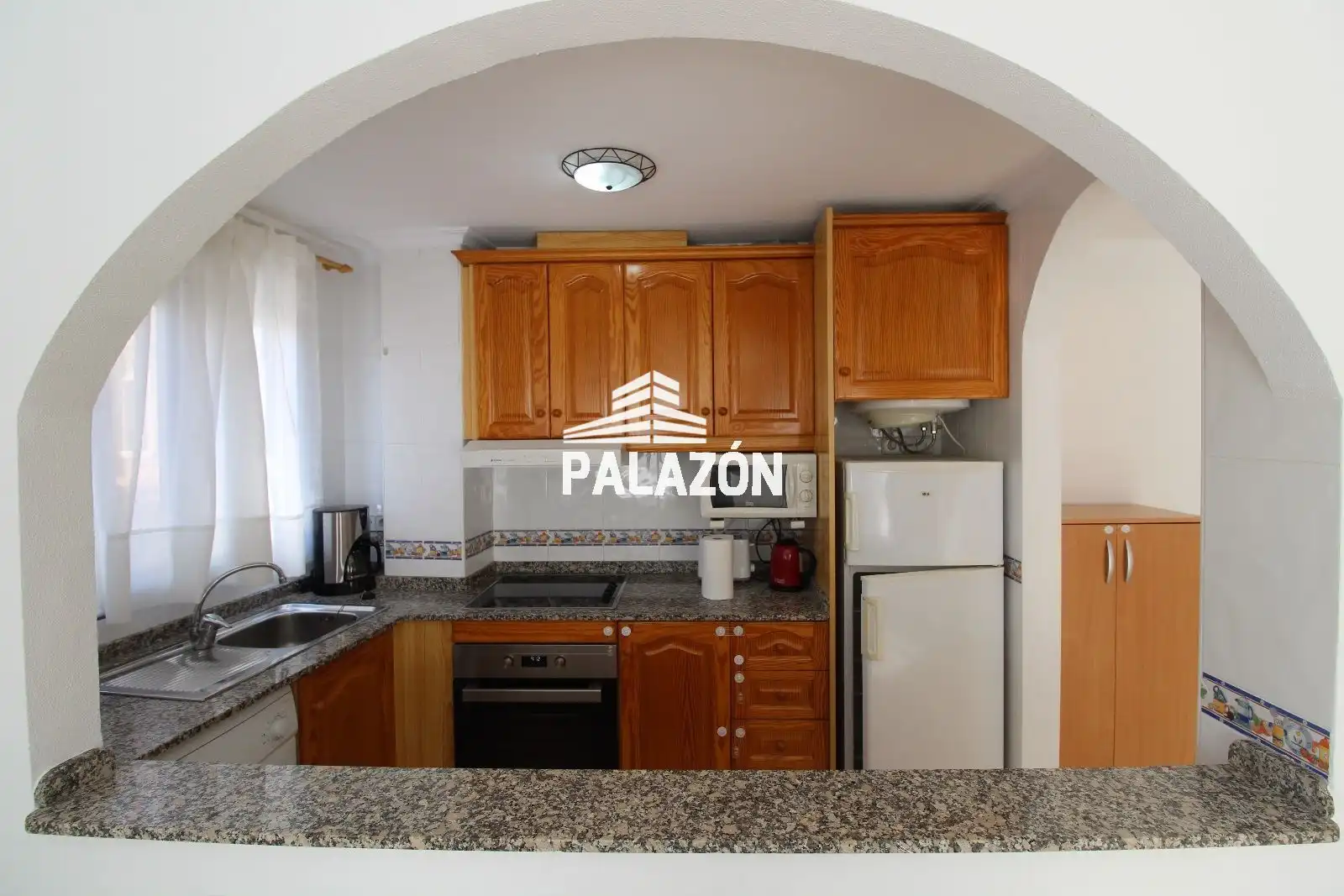 Cuina de Apartament de lloguer en Catral amb Aire condicionat, Terrassa i Piscina