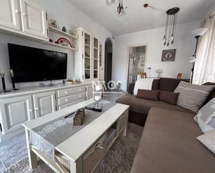 Sala d'estar de Casa o xalet en venda en Torrevieja amb Aire condicionat, Terrassa i Moblat
