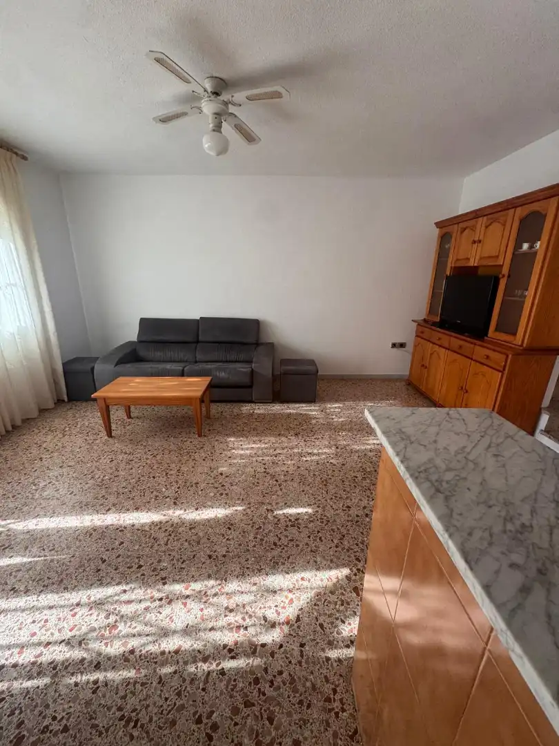Sala de estar de Casa adosada en venta en Vinaròs con Aire acondicionado, Jardín privado y Terraza