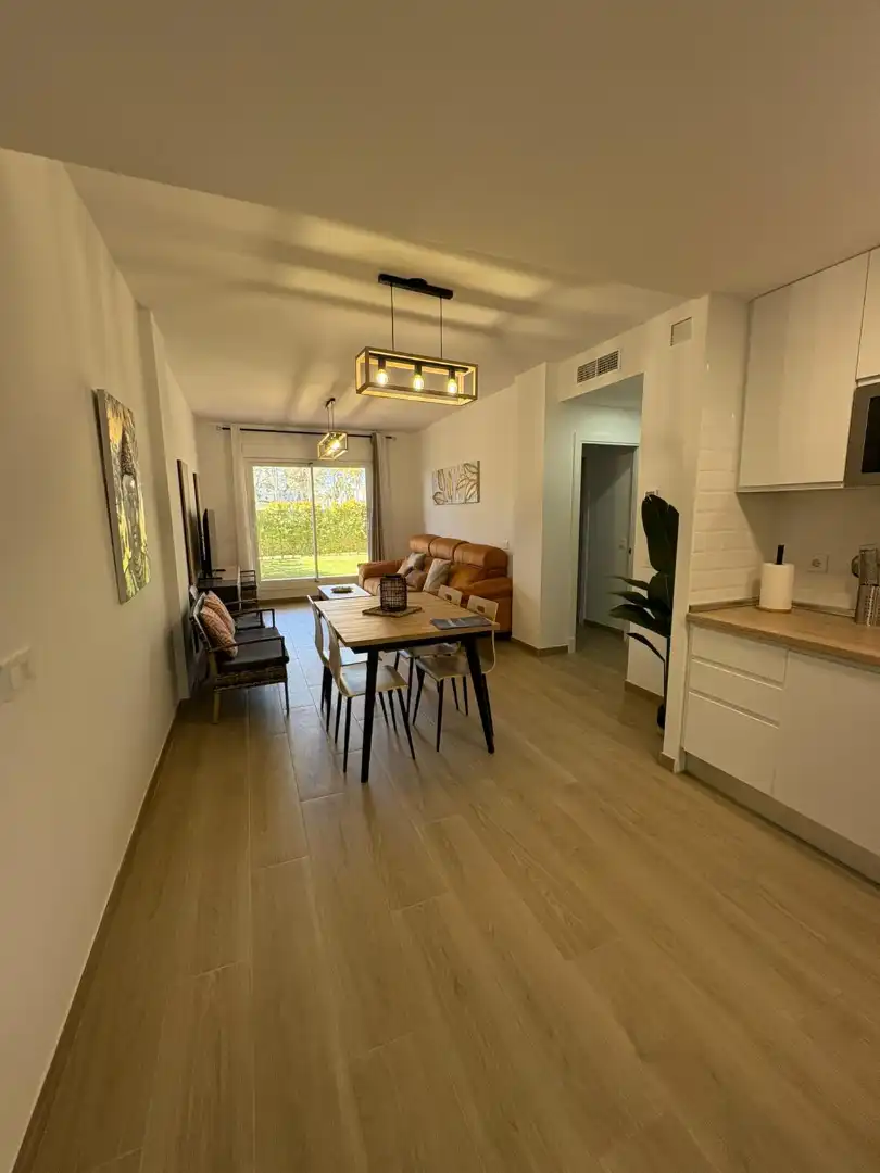 Wohnzimmer von Wohnung zum Verkauf in Chipiona mit Klimaanlage, Heizung und Privatgarten