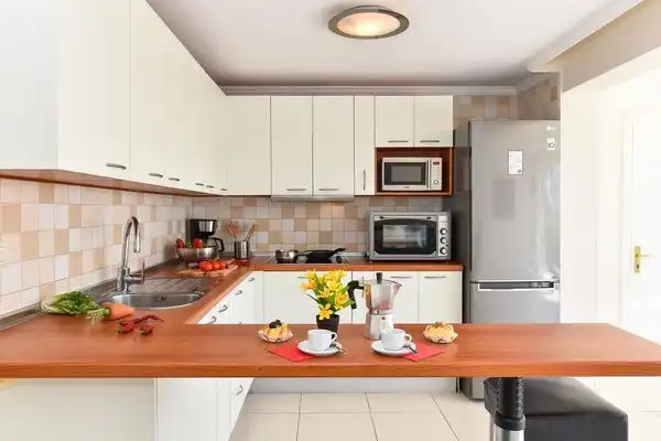 Kitchen of Flat for sale in San Bartolomé de Tirajana  with Air Conditioner and Community pool