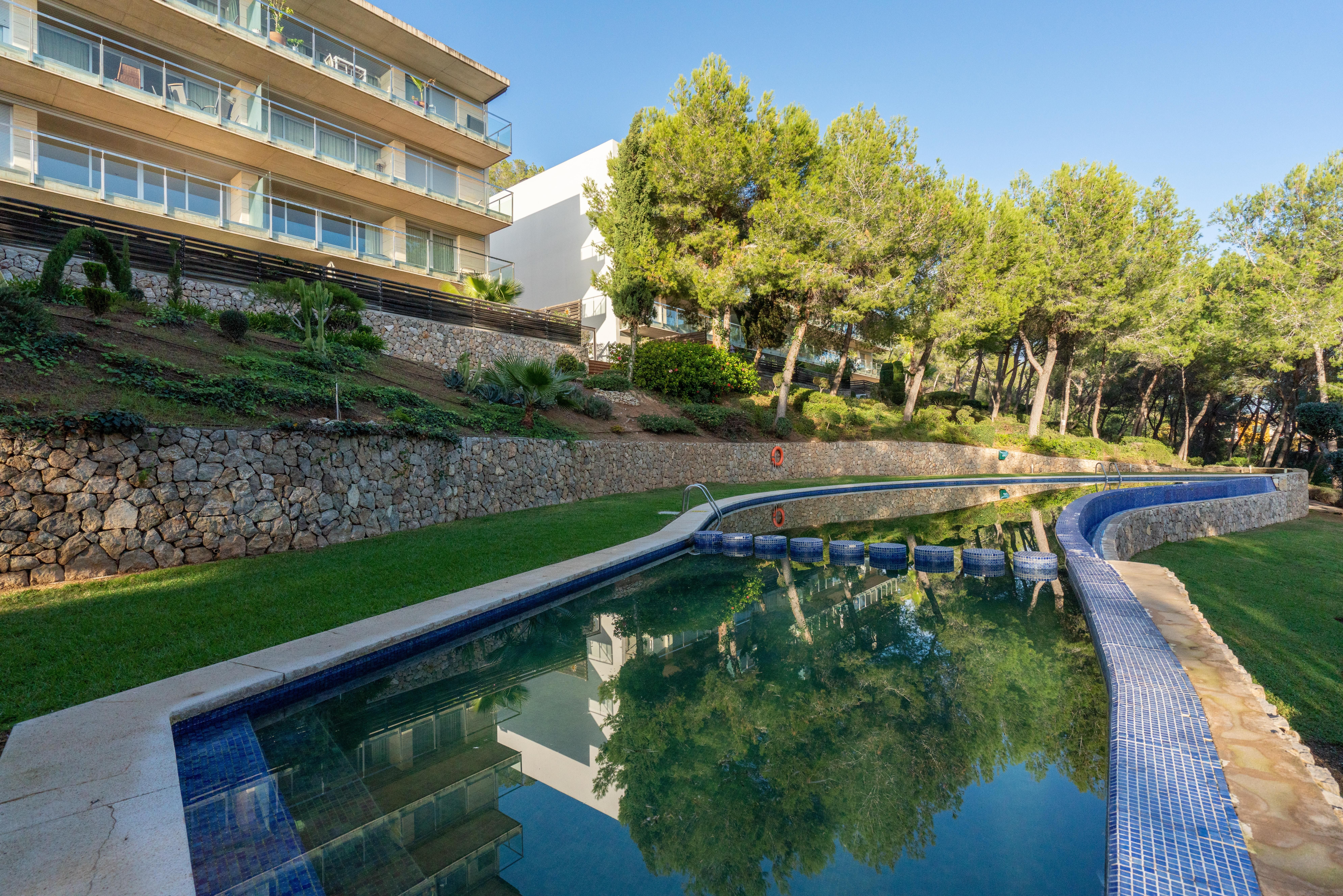 Swimming pool of Flat for sale in Calvià  with Air Conditioner, Parquet flooring and Storage room