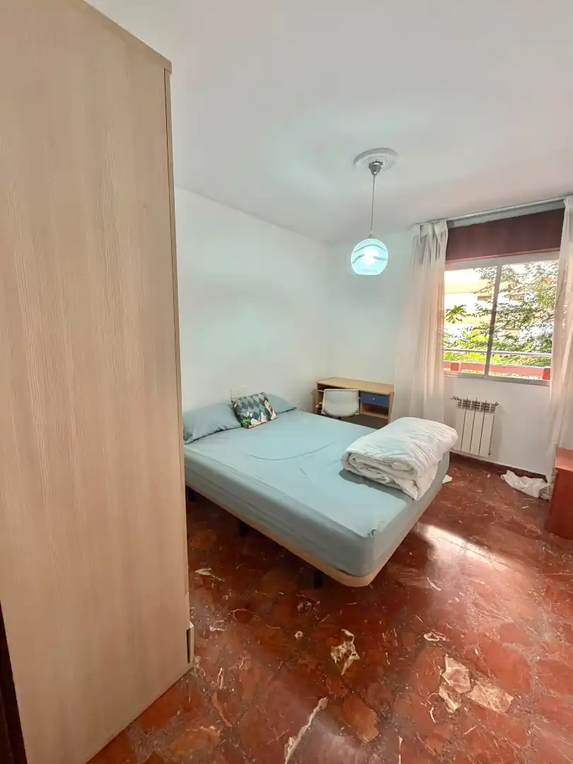 Bedroom of Flat for share in Jaén  with Air Conditioner, Heating and Furnished