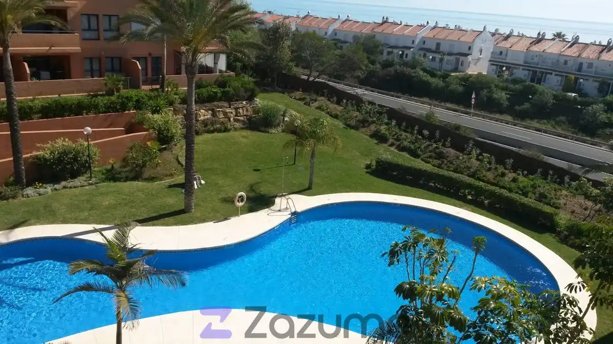 Jardín de Piso de alquiler en Manilva con Aire acondicionado, Terraza y Piscina