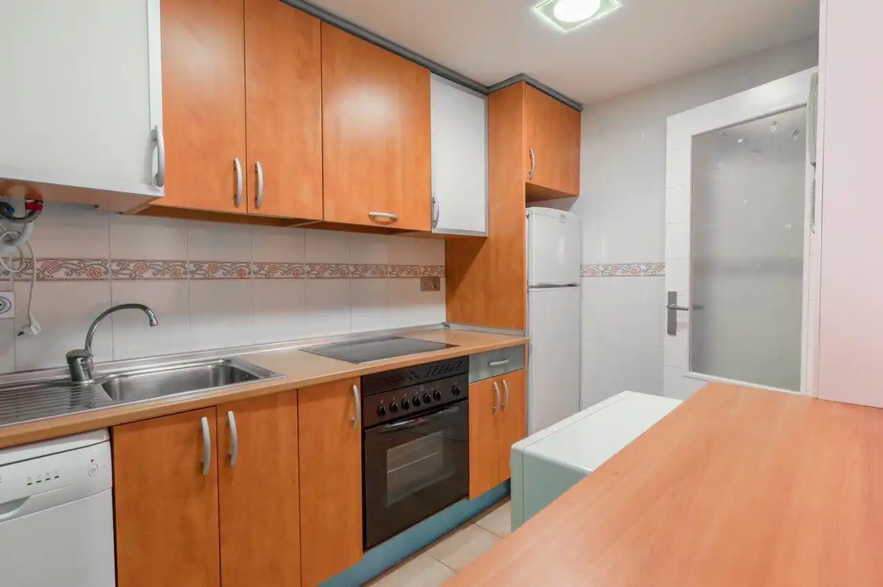 Cuina de Apartament de lloguer en La Manga del Mar Menor amb Aire condicionat, Calefacció i Piscina