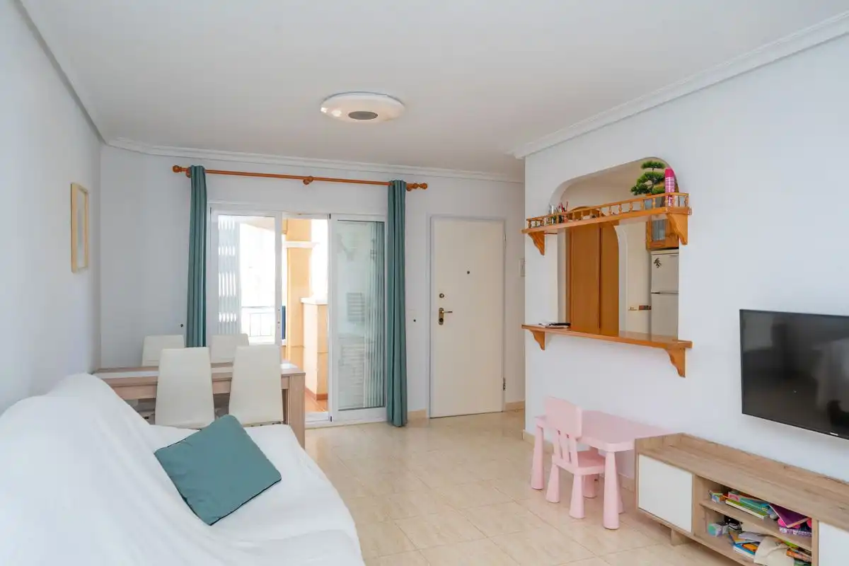 Sala d'estar de Dúplex en venda en Pilar de la Horadada amb Aire condicionat, Calefacció i Jardí privat