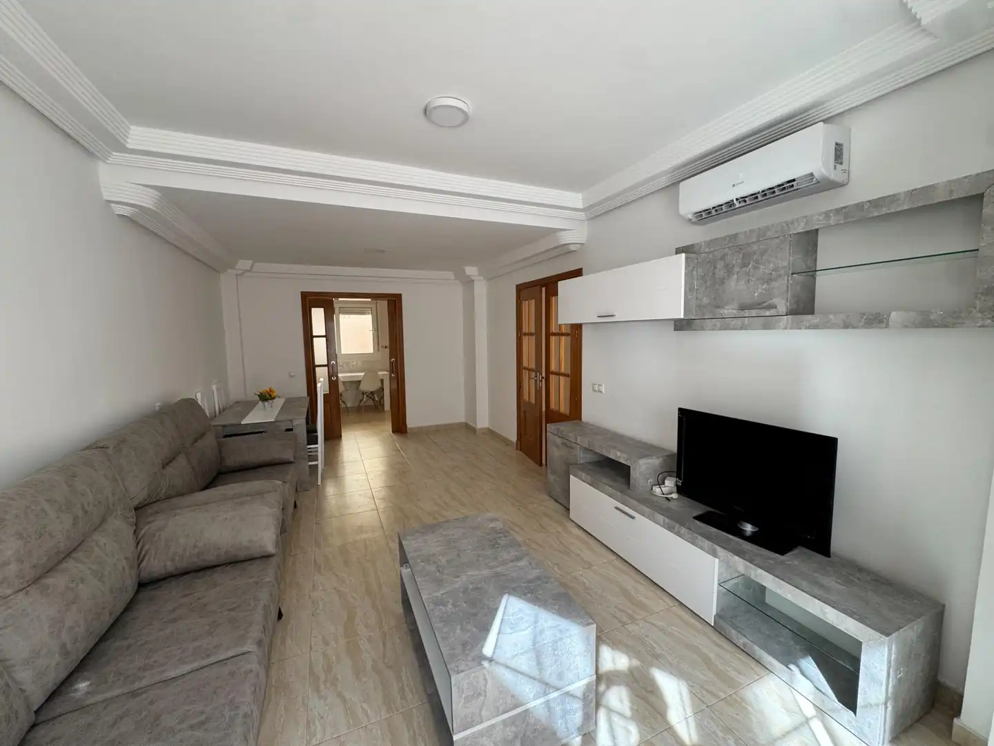 Sala d'estar de Casa adosada de lloguer en Roquetas de Mar