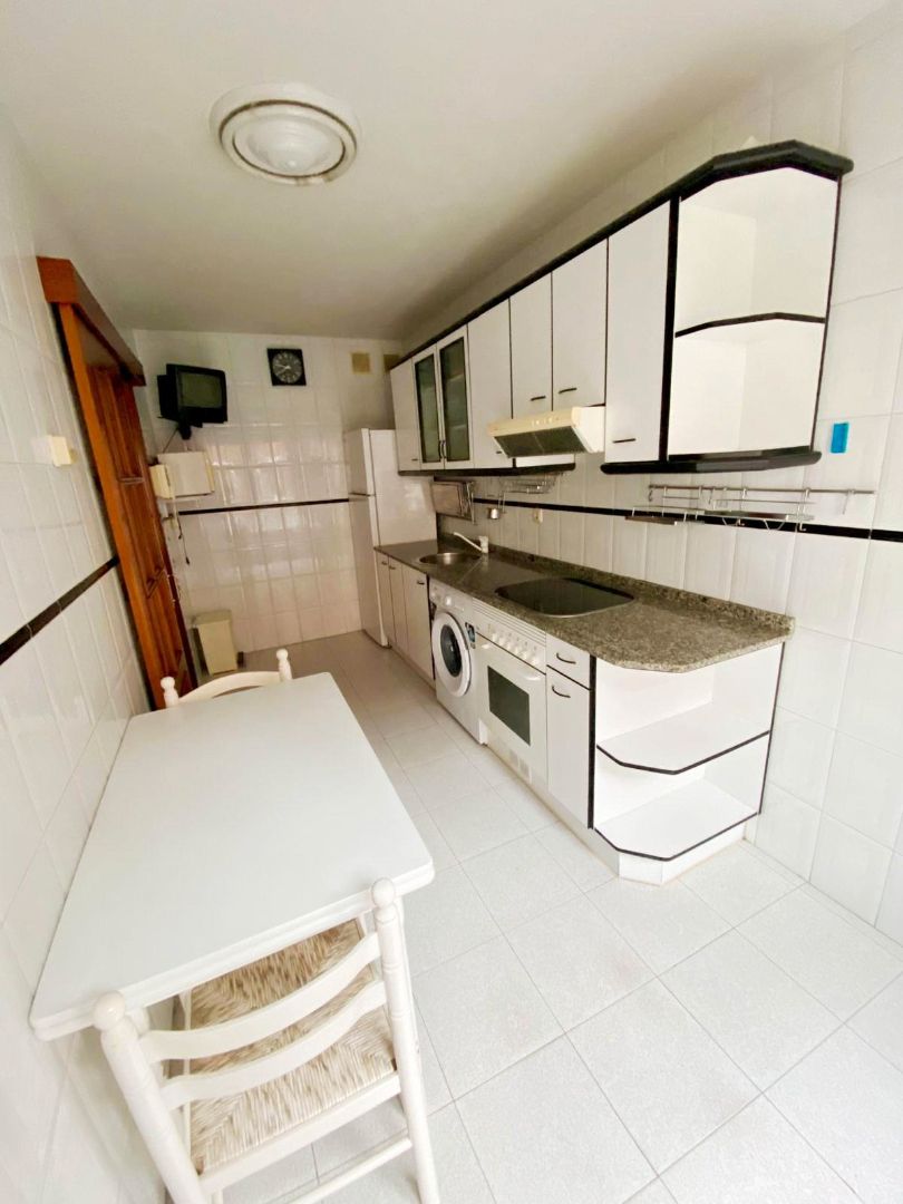 Kitchen of Apartment for sale in Gijón   with Parquet flooring, Storage room and Furnished