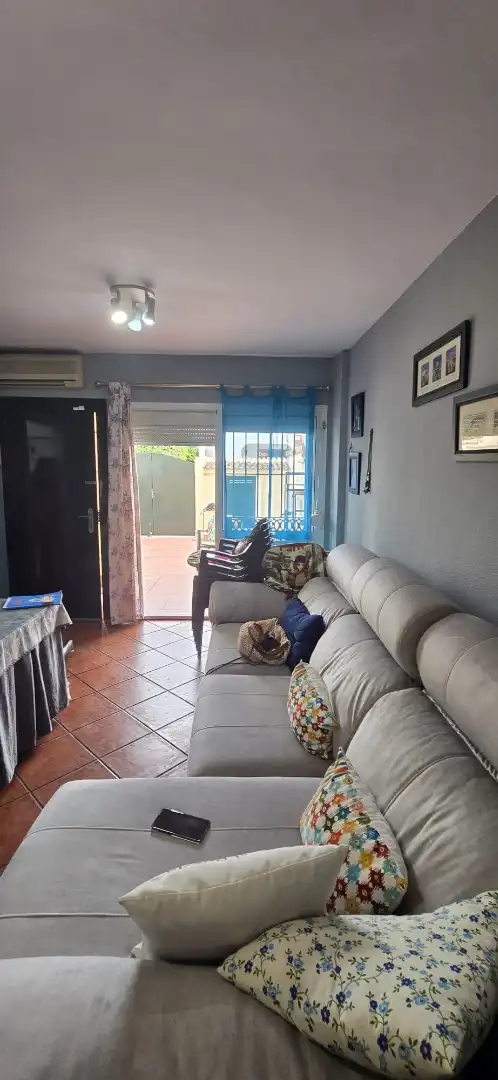 Sala de estar de Casa adosada en venta en El Portil con Aire acondicionado, Terraza y Trastero