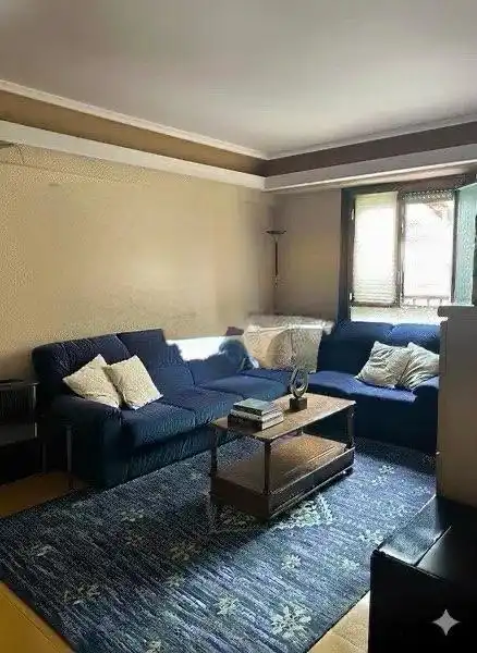 Sala de estar de Casa adosada en venta en Usurbil con Calefacción, Parquet y Amueblado