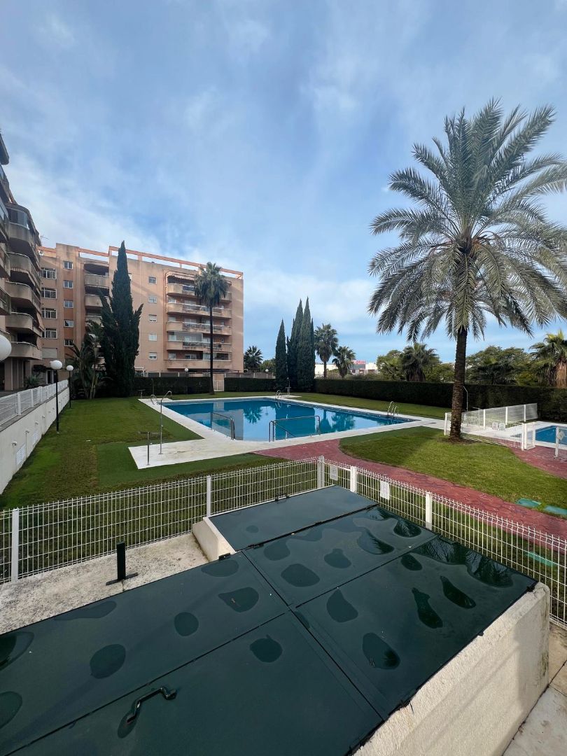 Swimming pool of Flat for sale in San Juan de Aznalfarache  with Air Conditioner, Heating and Terrace