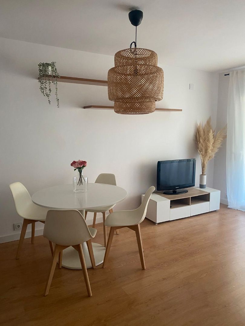 Sala d'estar de Apartament en venda en Sant Pol de Mar amb Parquet, Terrassa i Moblat