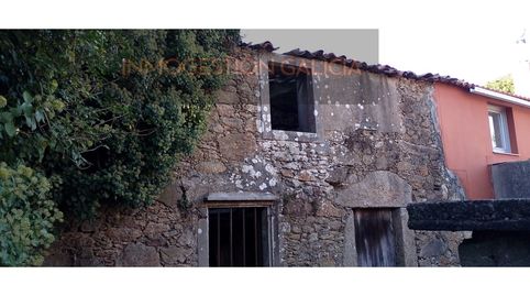 Casa de pueblo adosada con gran finca anexa