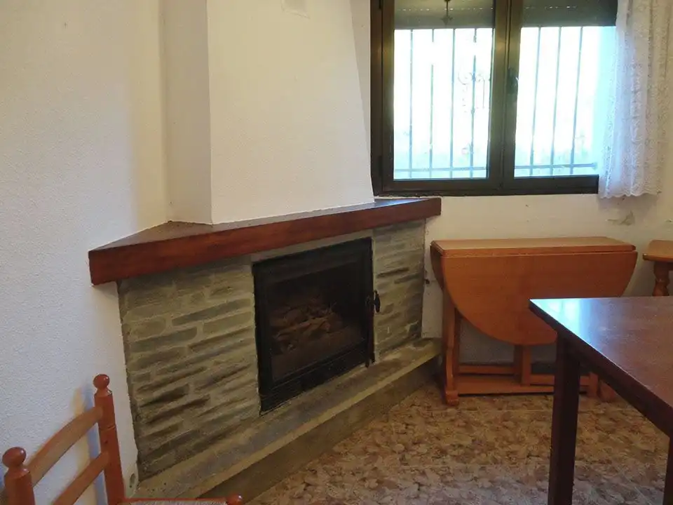 Sala de estar de Casa adosada en venta en Riocavado de la Sierra