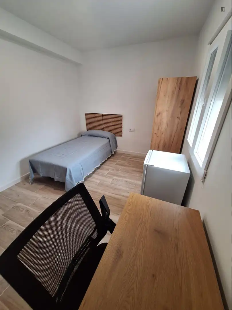 Habitación de Apartamento de alquiler en Valencia con Aire acondicionado, Calefacción y Amueblado
