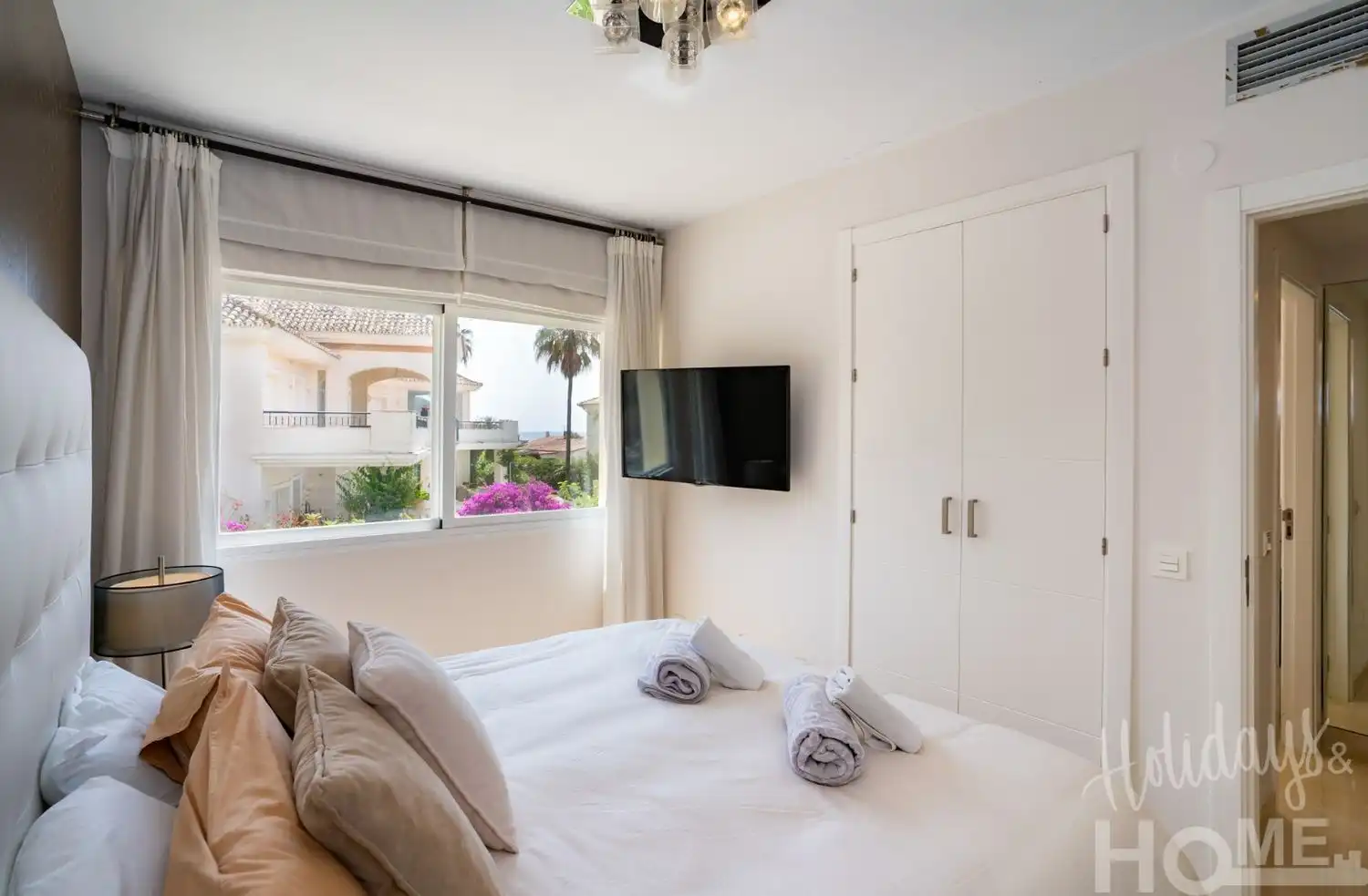 Dormitori de Pis de lloguer en Marbella amb Aire condicionat, Jardí privat i Terrassa