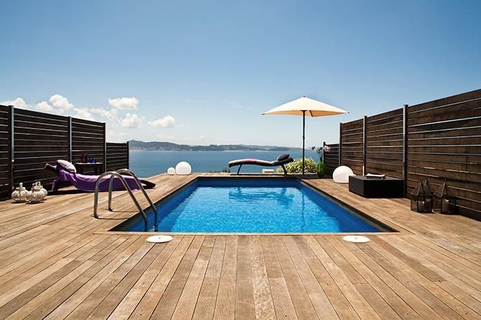 Piscina de Casa adosada en venda en Sanxenxo amb Aire condicionat, Jardí privat i Parquet
