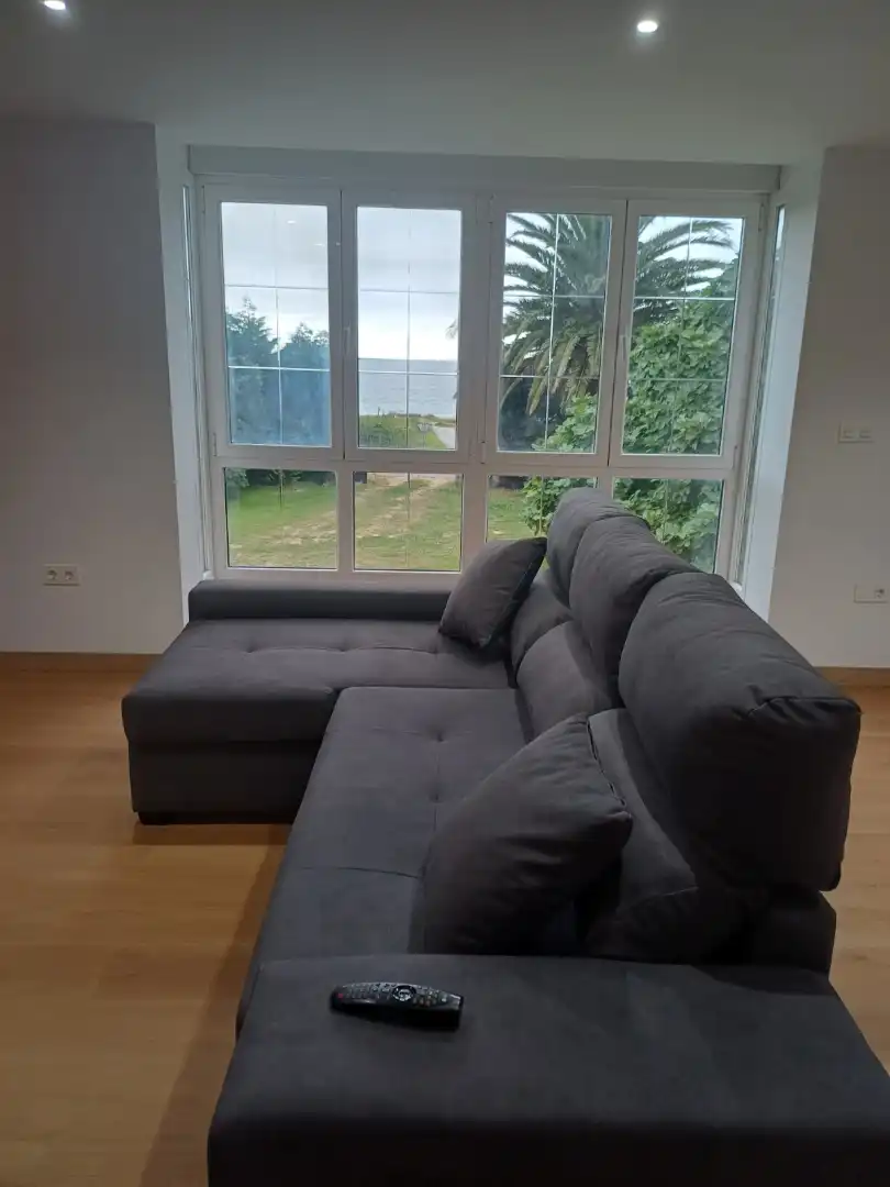Sala d'estar de Casa o xalet de lloguer en Foz amb Jardí privat i Moblat