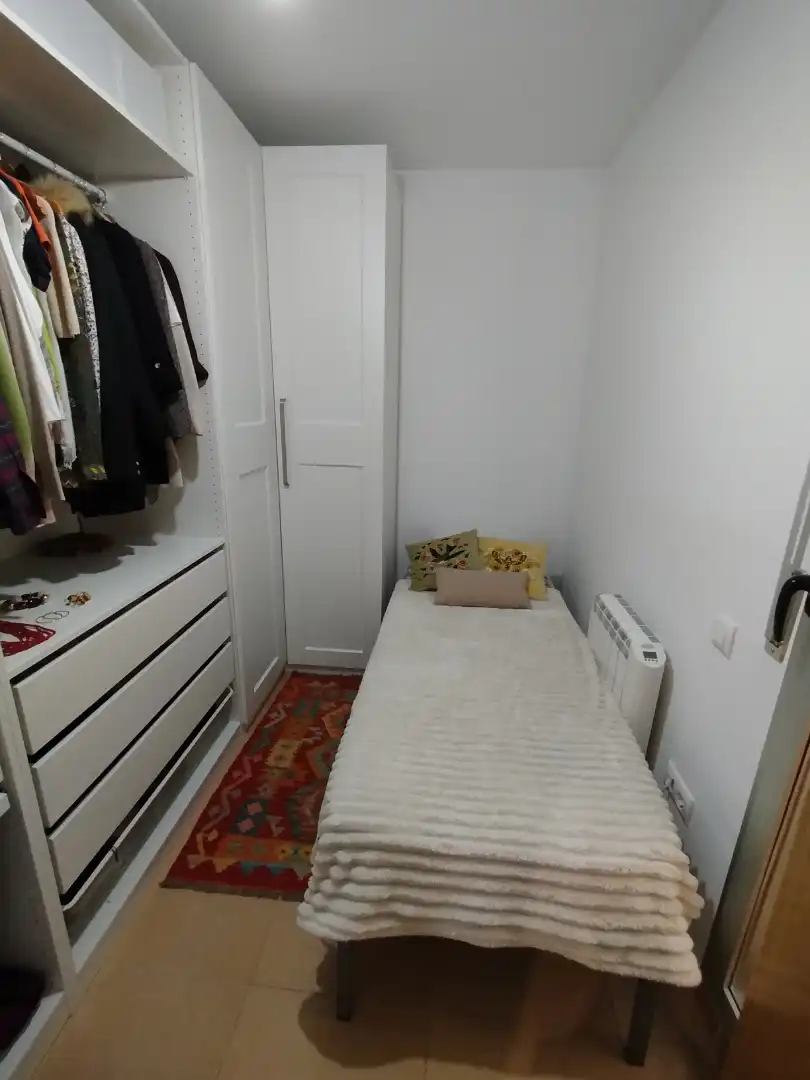 Schlafzimmer von Wohnung zum Verkauf in Vilallonga del Camp mit Klimaanlage, Heizung und Privatgarten