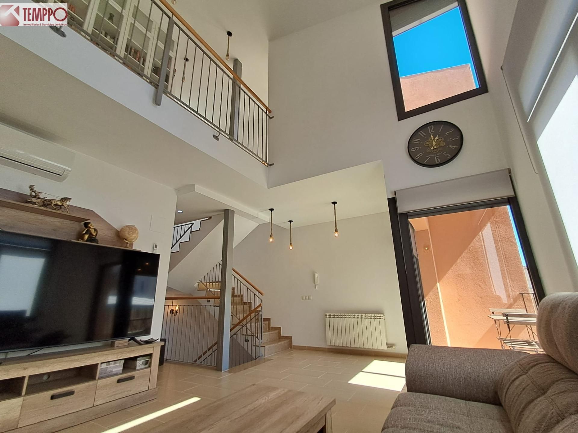 Sala de estar de Casa adosada en venta en Sant Jaume dels Domenys con Aire acondicionado, Calefacción y Jardín privado