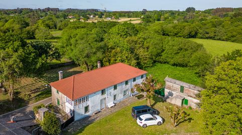 Conjunto rural con casa, palleira y terreno en Curtis