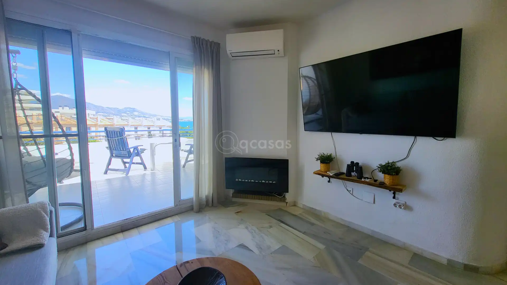 Wohnzimmer von Einfamilien-Reihenhaus zum Verkauf in Mijas mit Klimaanlage, Heizung und Terrasse