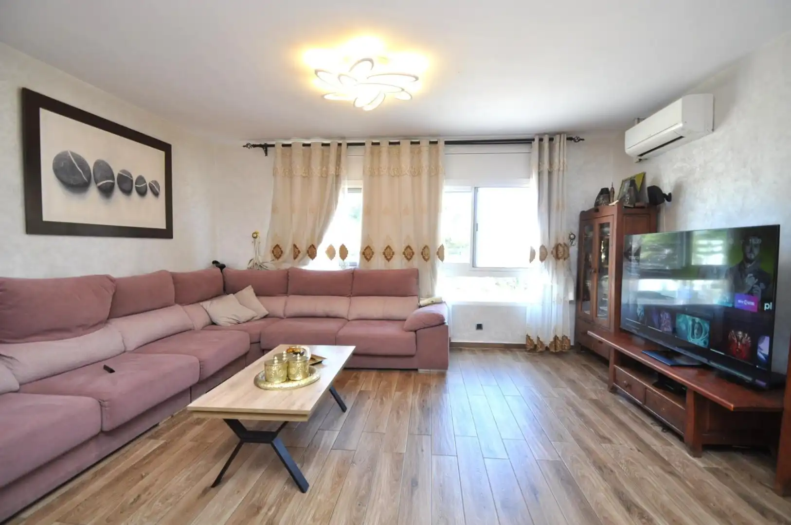 Sala de estar de Casa adosada en venta en La Ràpita con Terraza