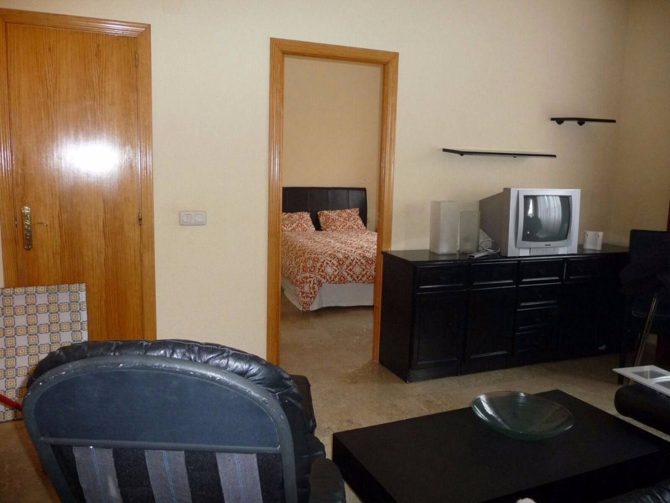 Dormitori de Apartament de lloguer en Mérida amb Aire condicionat