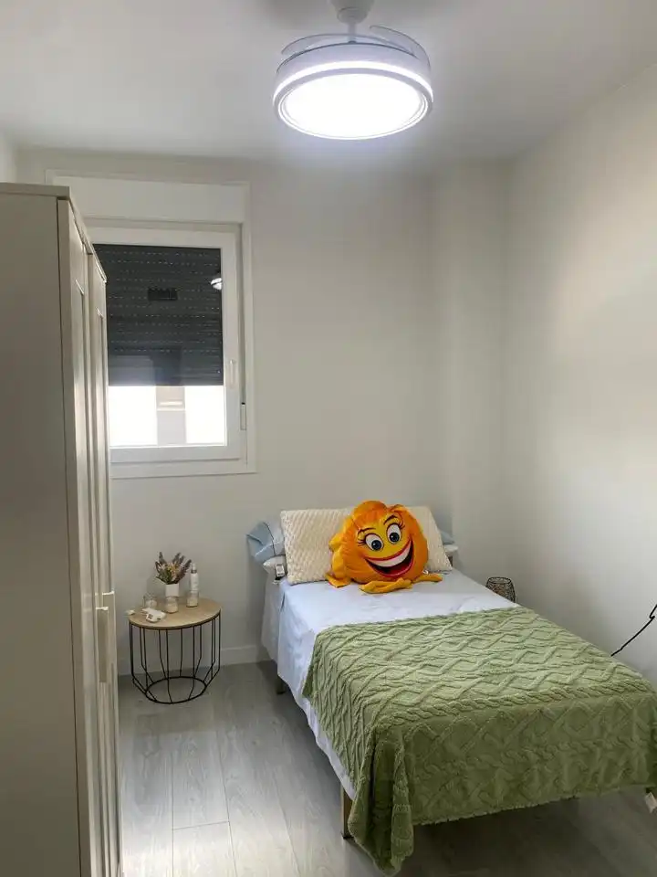 Bedroom of Flat for share in Dos Hermanas