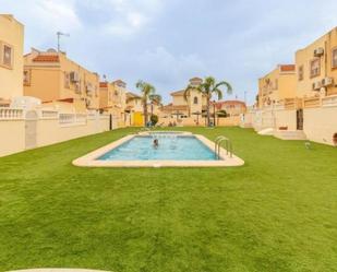 Swimming pool of Single-family semi-detached for sale in Orihuela  with Air Conditioner, Terrace and Balcony
