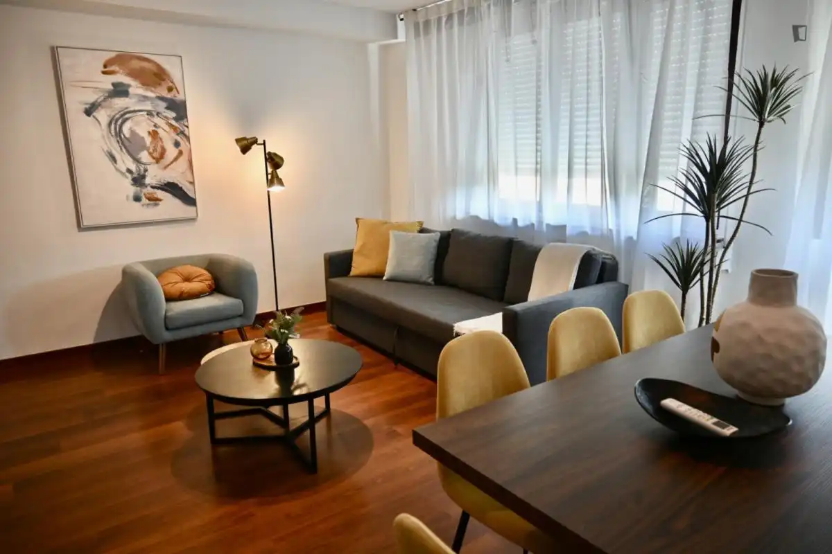 Sala de estar de Apartamento de alquiler en  Madrid Capital con Aire acondicionado, Calefacción y Amueblado