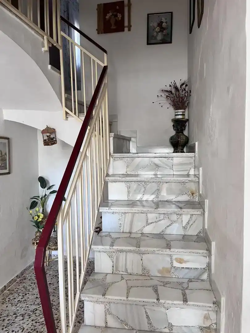 Casa adosada en venda en Baza amb Balcó