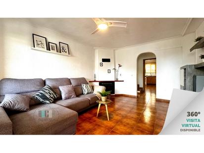 Sala d'estar de Casa adosada en venda en Benicasim / Benicàssim amb Terrassa
