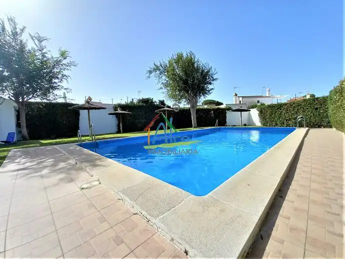 Piscina de Casa adosada en venta en Almonte con Aire acondicionado, Calefacción y Jardín privado