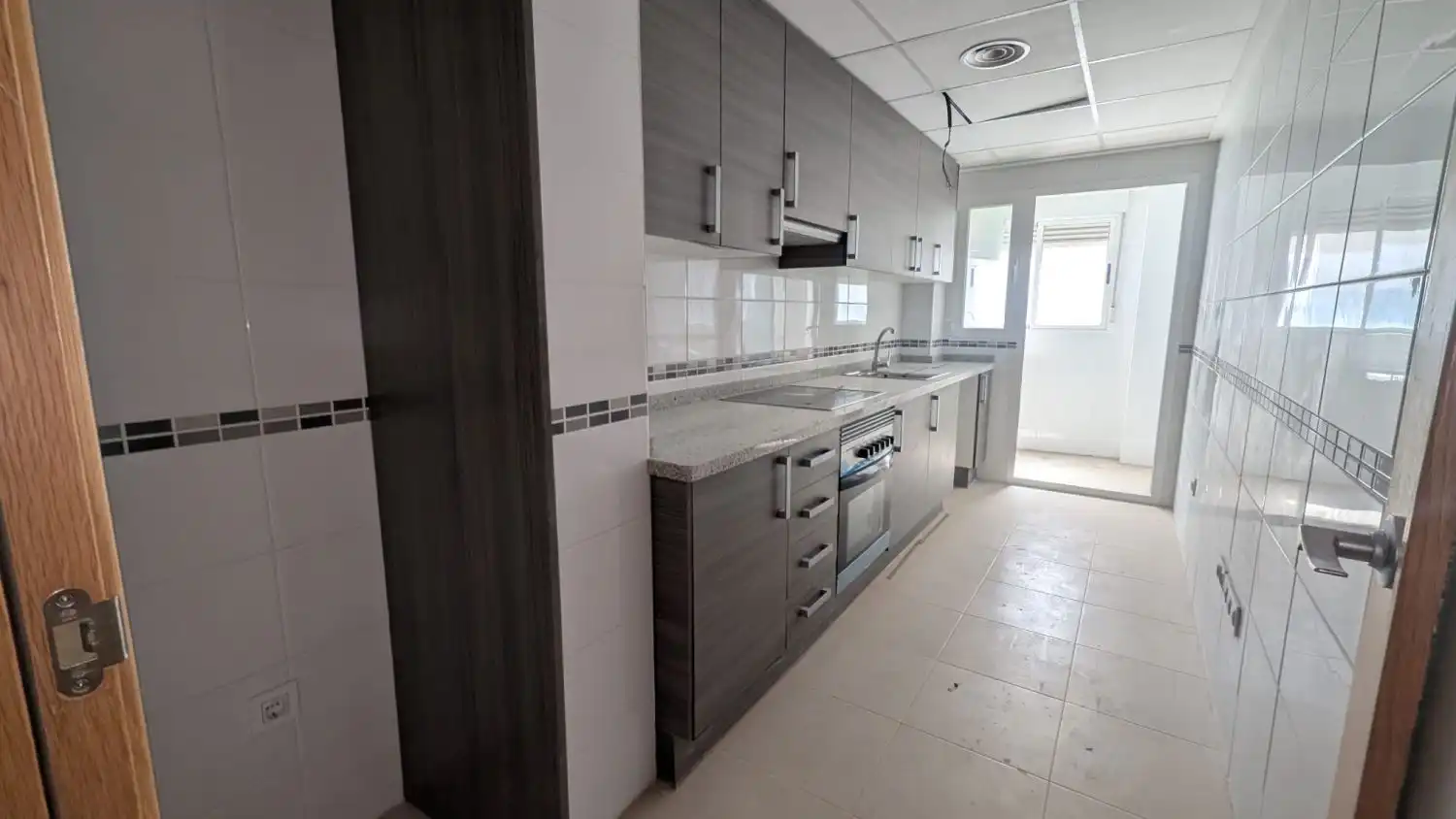 Kitchen of Flat for sale in Almazora / Almassora  with Air Conditioner and Storage room