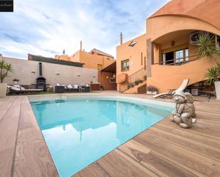 Piscina de Casa adosada en venda en Las Gabias amb Aire condicionat, Calefacció i Jardí privat