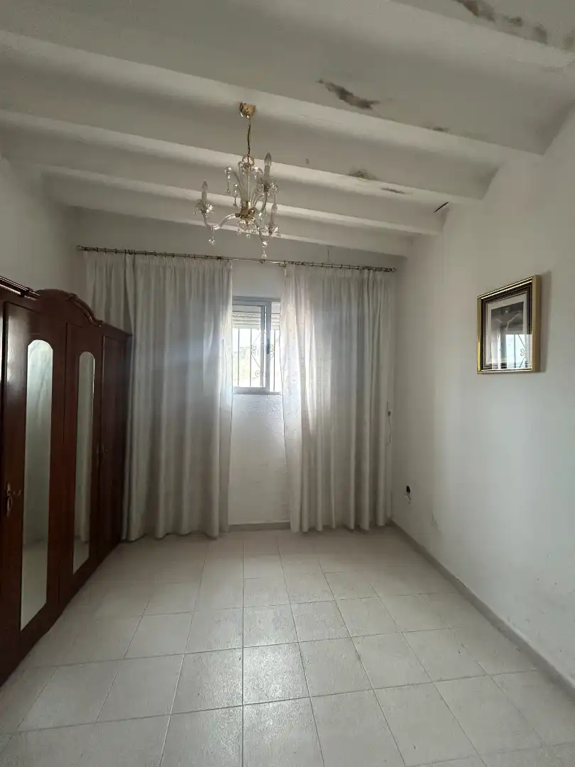 Dormitori de Casa adosada en venda en Vélez-Málaga amb Terrassa, Traster i Moblat