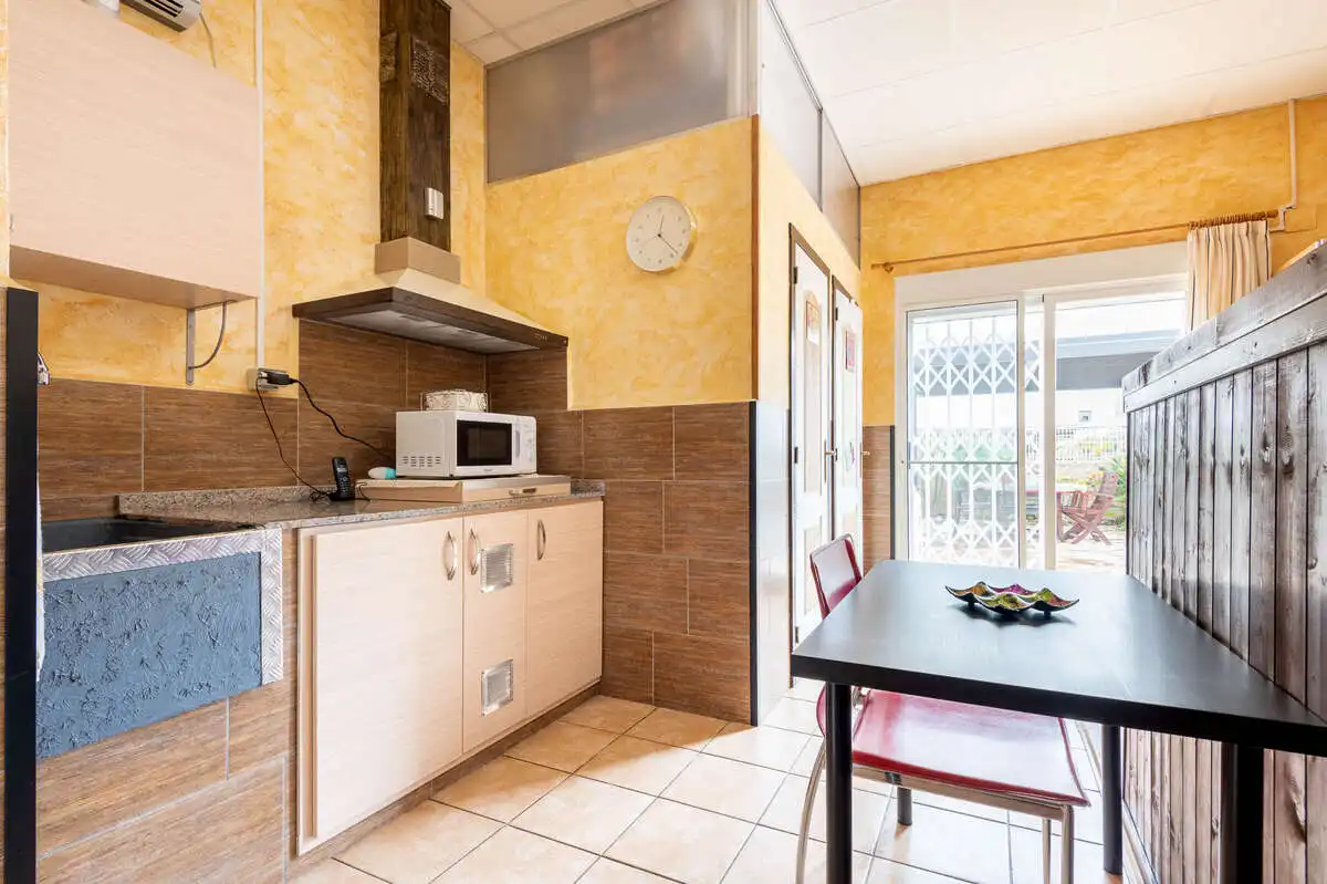 Cocina de Casa adosada en venta en Les Alqueries / Alquerías del Niño Perdido con Aire acondicionado, Calefacción y Jardín privado