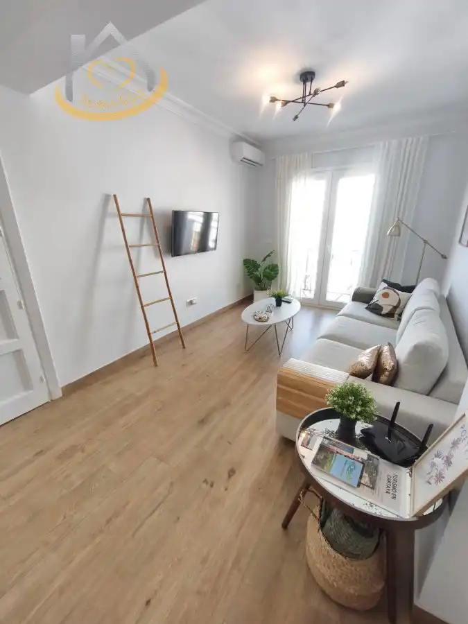 Sala de estar de Piso en venta en Cartaya con Aire acondicionado, Trastero y Amueblado