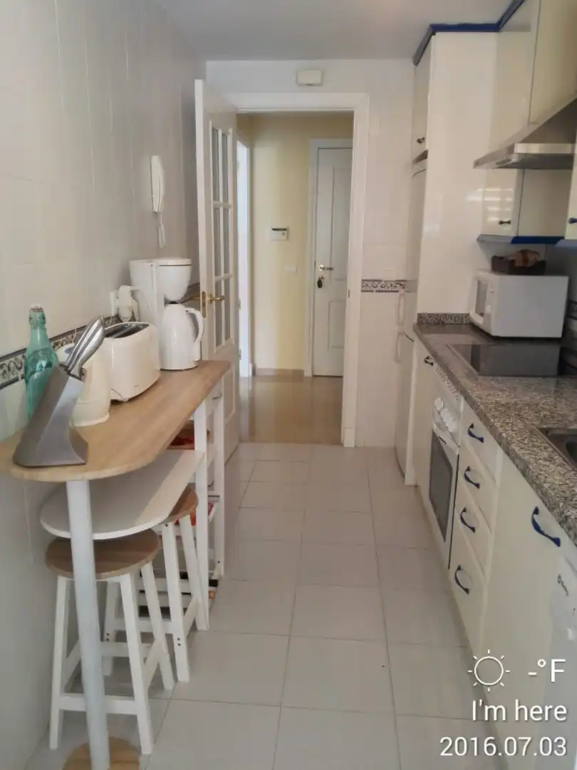 Cuina de Apartament en venda en Manilva amb Aire condicionat, Terrassa i Moblat