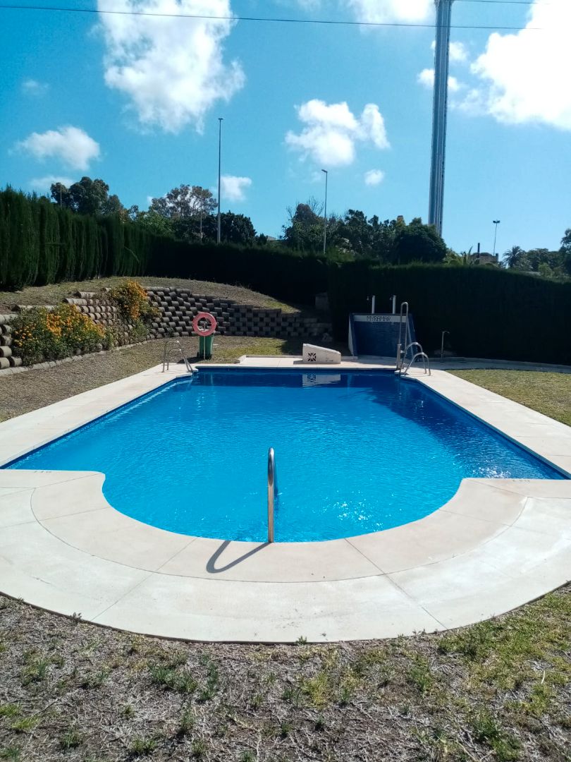 Swimming pool of Flat for sale in Benalmádena  with Terrace, Storage room and Furnished